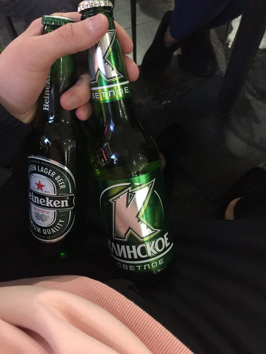 фото банка пива в руке