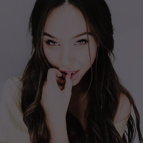 She wore a smile like a loaded gun.