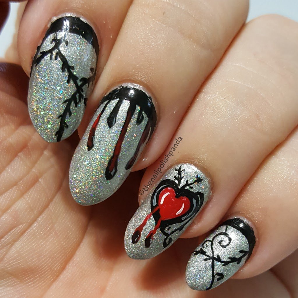 RavenVelith's tweet image. My favourite nail art of 2017 inspired by kakinenailart. Also it was the first time I went proper claw nails. How I miss them. #nails #nailart #holosexual #handpainted