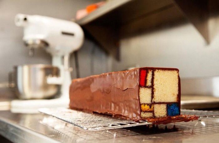 End of working day! 🍰☕️ The café's most popular item is a #dessert inspired by the #art of Piet #Mondrian, featuring geometric blocks of white velvet #cake, colored red, blue and yellow, stacked together and glued with #chocolate.