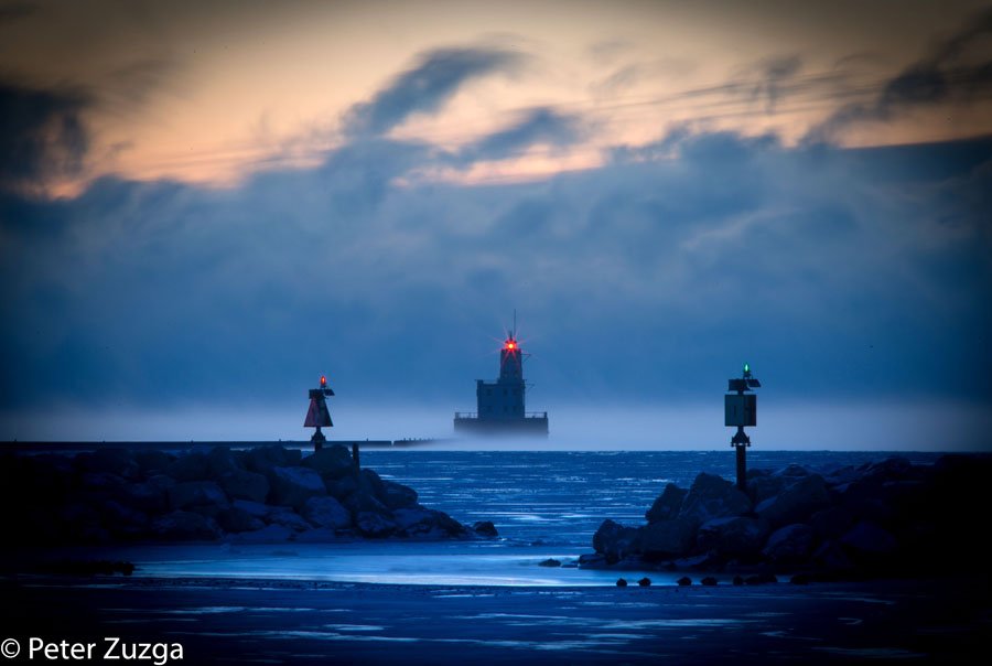 Water Vapor shrouds the Main Gap Lighthouse on a -25 degree windchill dawn in the <a href="/MichiganCoast/">Lake Michigan Coast</a> in <a href="/visitmilwaukee/">Visit Milwaukee</a> today. #coldweather #cold #Milwaukee #Lighthouse #windchill