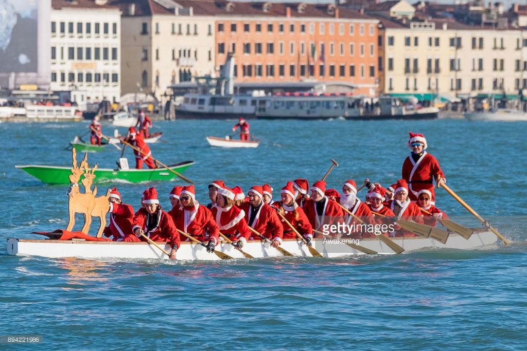Rowers dressed as Santa take part in the annual Father Christmas Regatta organized by University <a href="/CaFoscari/">Università Ca' Foscari Venezia</a> on the Grand Canal on December 17, 2017 in #Venice. Photo by <a href="/stmaefzz/">Stefano Mazzola</a>  <a href="/GettyImages/">Getty Images</a> buff.ly/2Dv2sGM