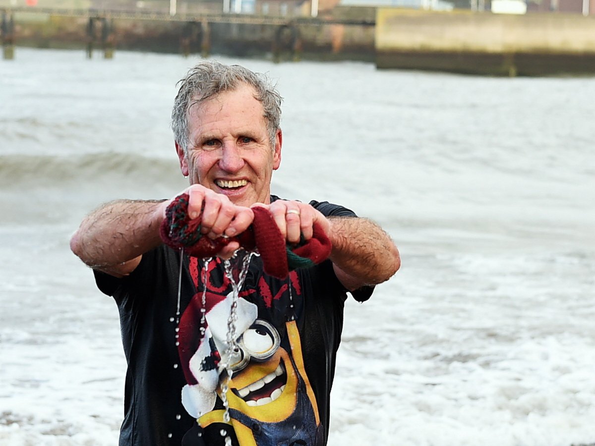 mikemckenzieis's tweet photo. BRrrr. That's the annual charity New Year's Eve dip in Whitehaven harbour done, now to go and crack out my last #cnrun #festivestreak.  After warming up that is.  This was the second swim for me as the wife's camera conked out! https://t.co/2aBmZQatoV