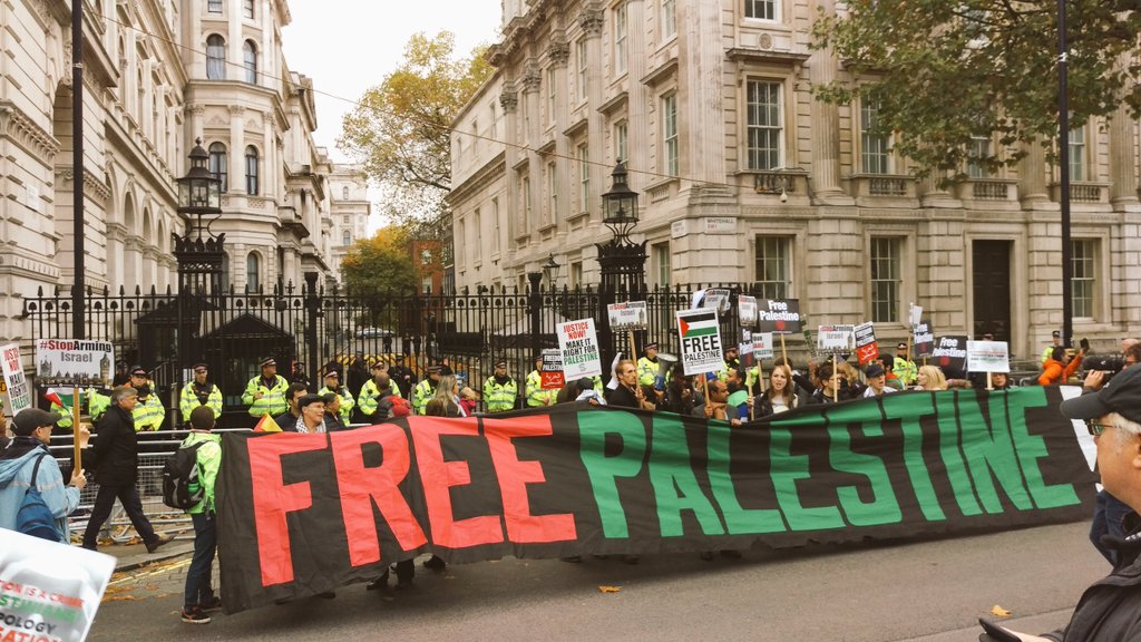 BrightonBDS's tweet photo. 2017 we also hit London, gave the Israeli ambassador a warm welcome to Brighton, said no to walls &amp; borders &amp; made a mockery of Israel's ban on #BDS activists https://t.co/mzolaRb2gm