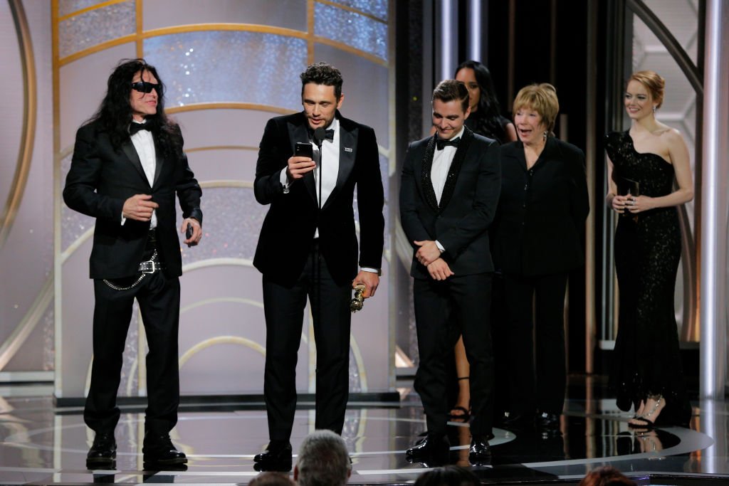 spynews's tweet photo. James Franco blocks Tommy Wiseau from finally getting his Golden Globes moment https://t.co/gXVTUzHoWk https://t.co/lU3VO9IG4c