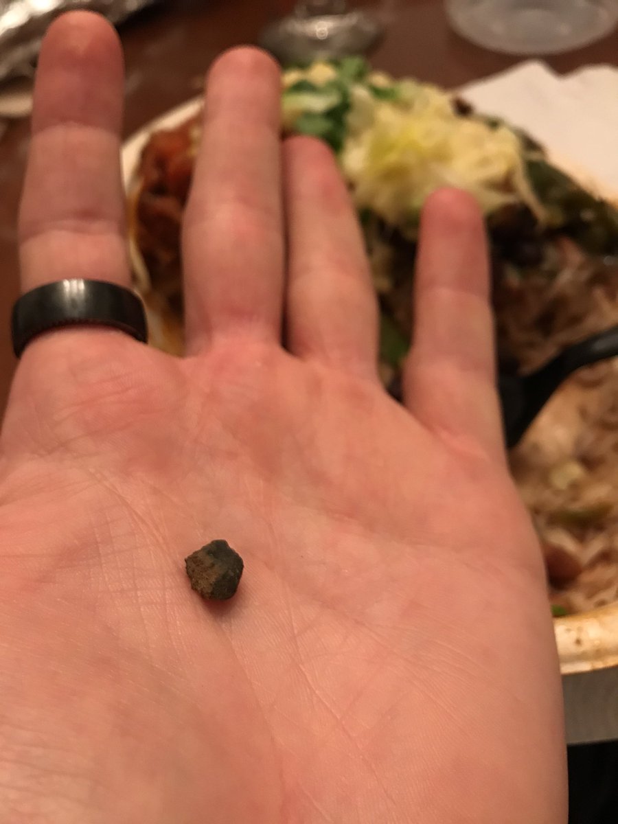 Just bit into a rock that came out of my <a href="/ChipotleTweets/">Chipotle</a> bowl... that was a bit strange.... free burritos for a year?!?! Done.