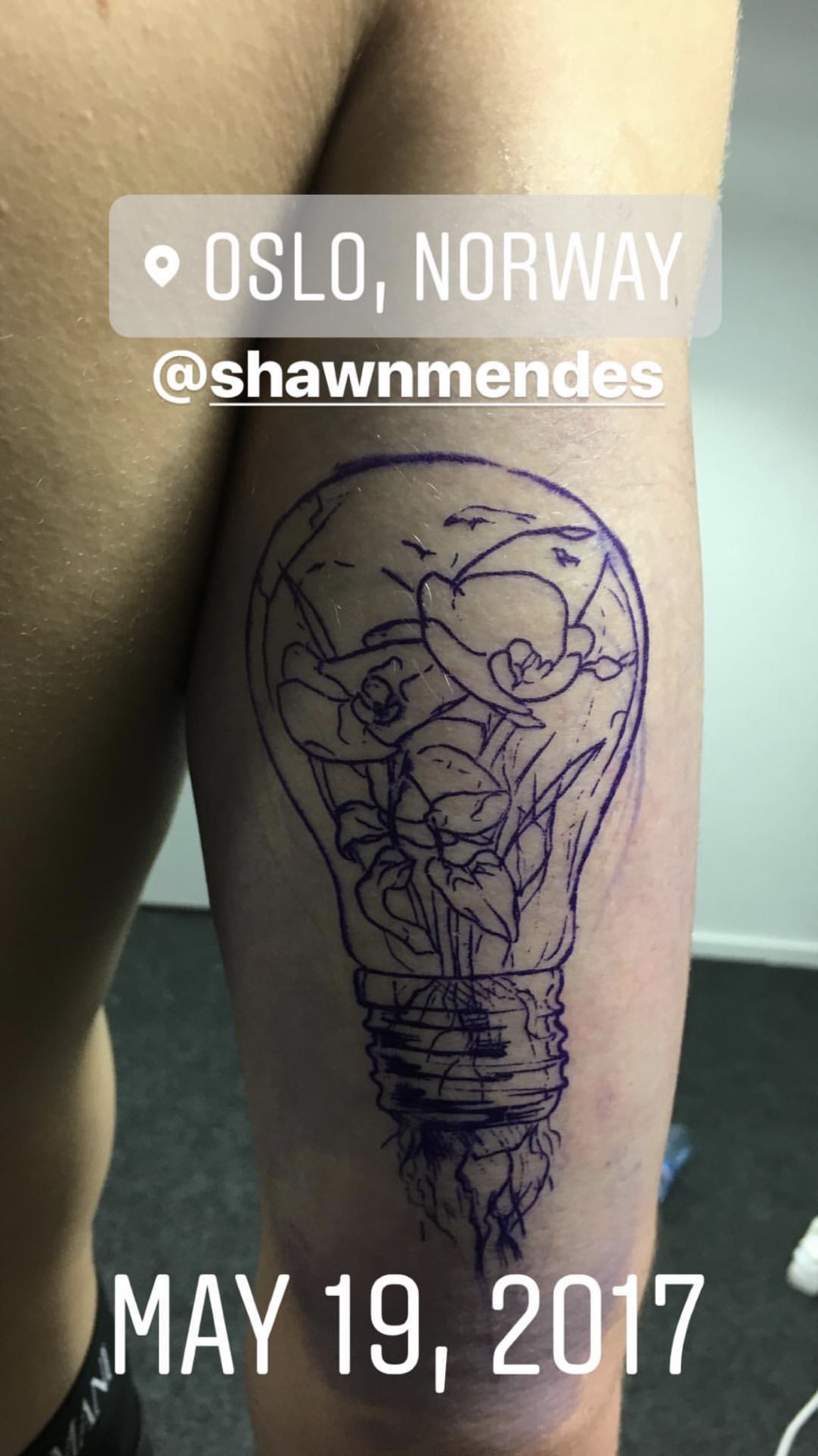 Light bulb tattoo with the filament saying 