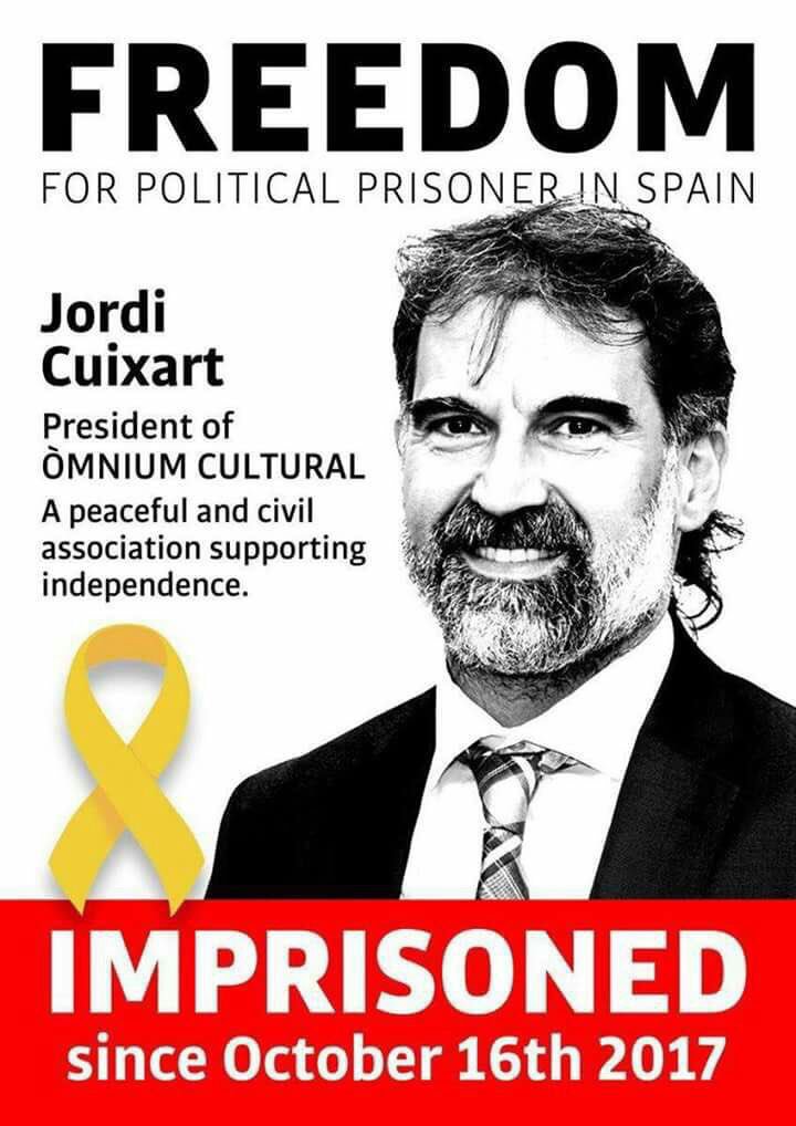 JoanTarda's tweet photo. Primer dia de 2018 i un compromís compartit: no permetre  que aconsegueixin “normalitzar” l’existència  de presos polítics. Feu córrer arreu les imatges! https://t.co/8S8QcUxZzM