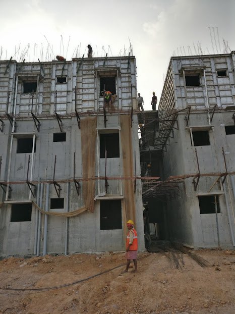 I was said that the entire construction in the site will be closed by March 2018. Every three weeks they complete a block. It is mind blowing speed. Its just marvellous that the govt. is constructing quality houses with the best technology and at greatest speed.