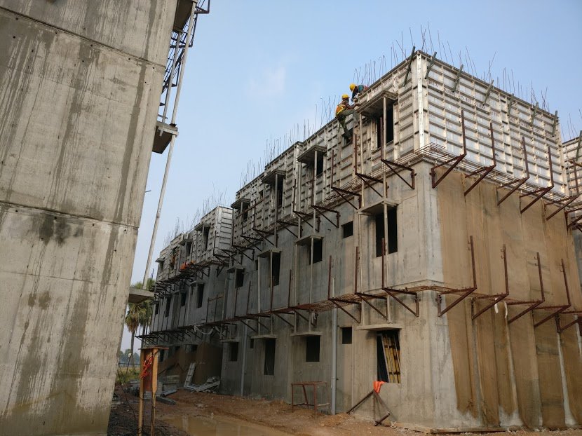 I was said that the entire construction in the site will be closed by March 2018. Every three weeks they complete a block. It is mind blowing speed. Its just marvellous that the govt. is constructing quality houses with the best technology and at greatest speed.