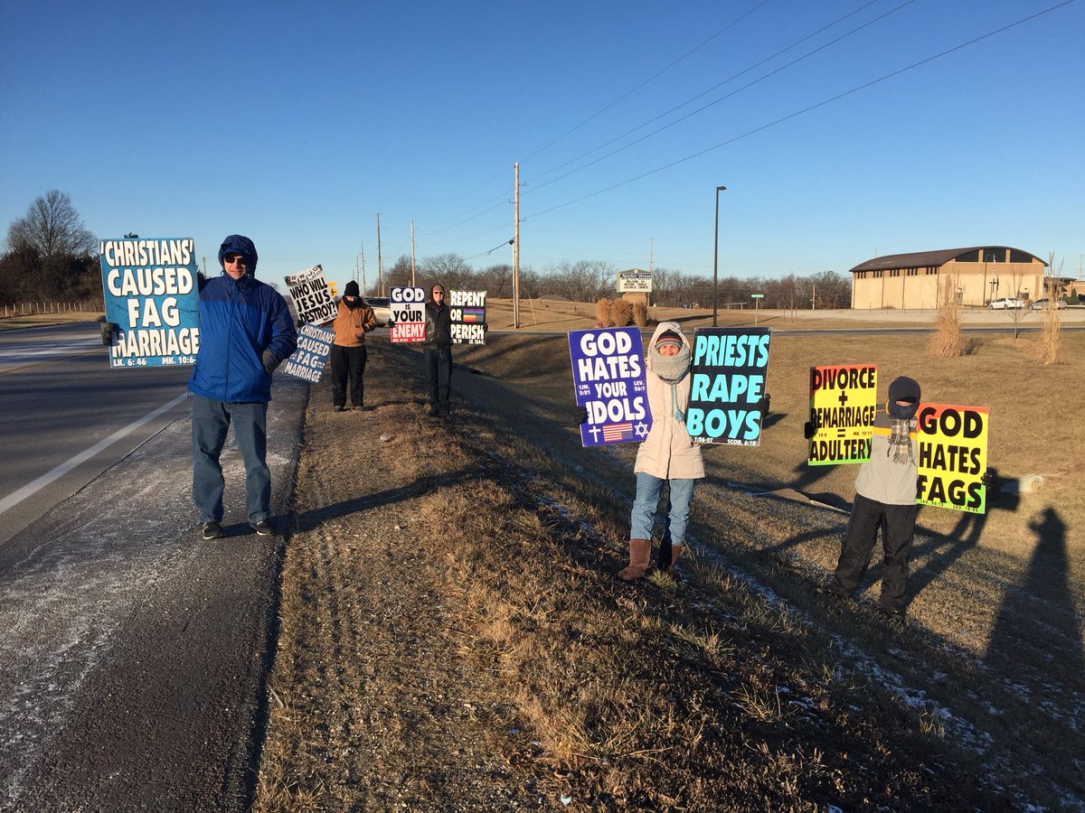 WBCTrumpet's tweet photo. LIVE: Bright and early on #HappyNewYear2018 we are on the streets again, outside a local Catholic Church, trumpeting repentance for the mournful sinner. You’re still alive, and can lay down your sinful rebellion-arms, and be saved from the coming destruction. #ChristReturneth https://t.co/59eFwOH9Vi