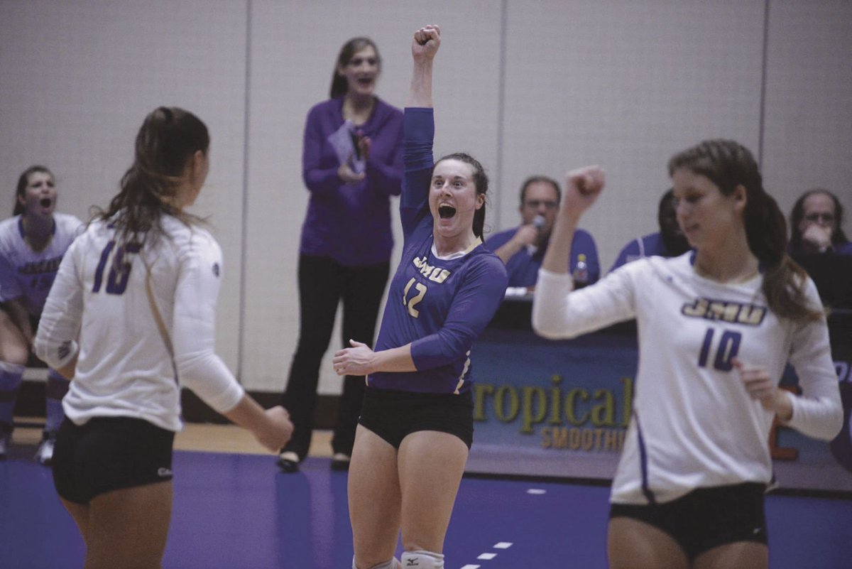 TheBreezeSports's tweet photo. No. 3: JMU volleyball hoists the CAA trophy https://t.co/g02dWpBluy