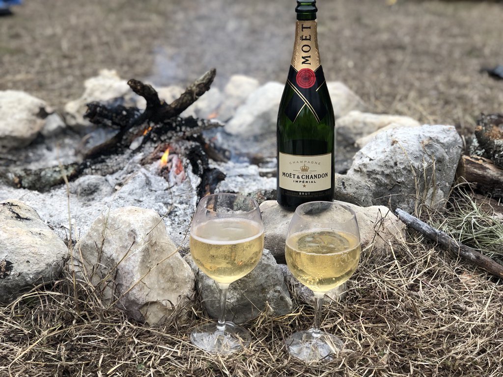 This is how we roll for New Year’s at <a href="/WhileInTheWild/">While in the Wild</a> a bottle of @MoetUSA by the campfire. Happy New Year everyone!