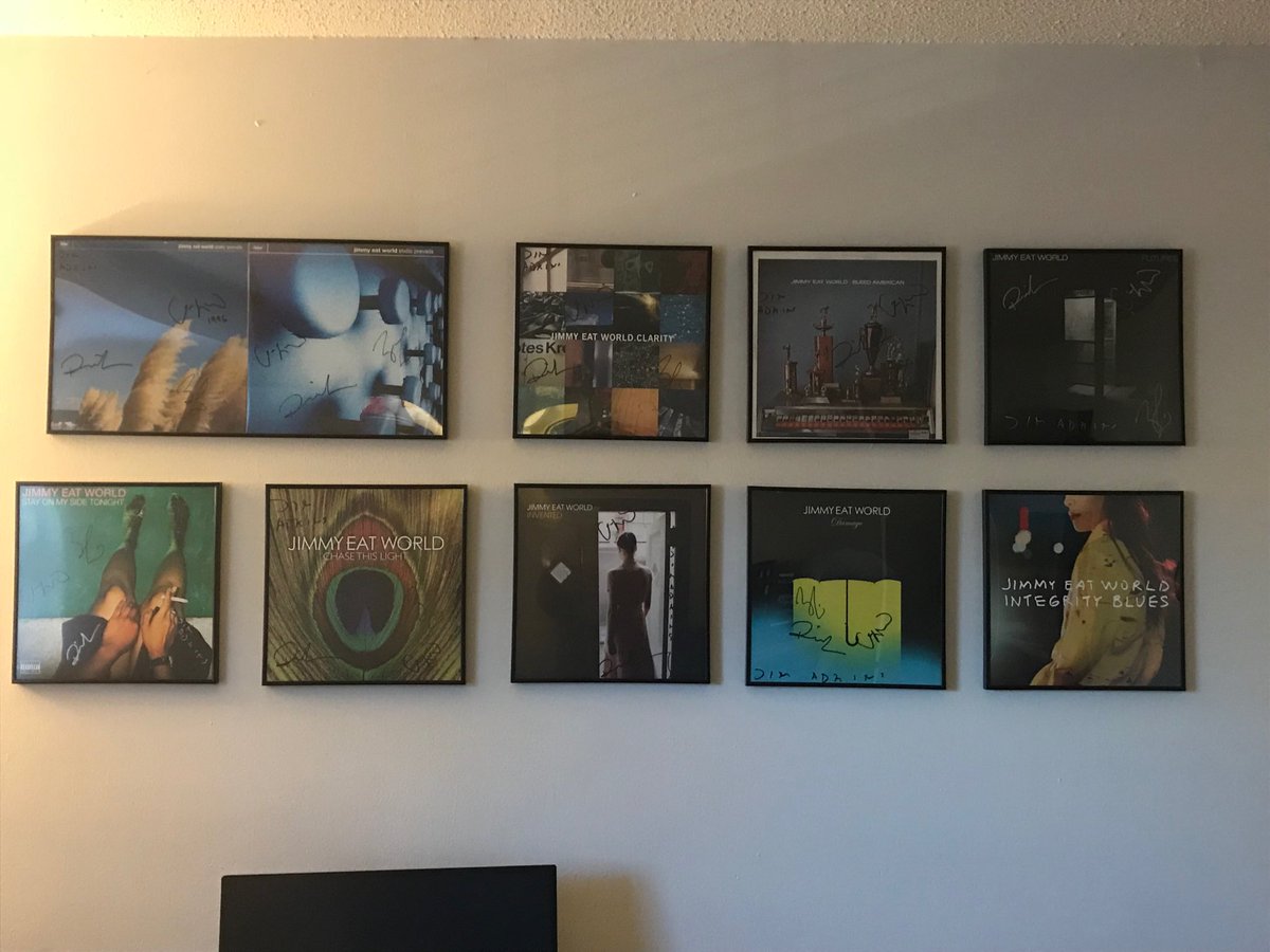 mleatherwood's tweet photo. Finally got my @jimmyeatworld records on the wall. All original pressings except #BleedAmerican (2nd US press 2003). All signed by the band except #IntegrityBlues. #vinyl #futuremancave https://t.co/aZs3NIbG6t