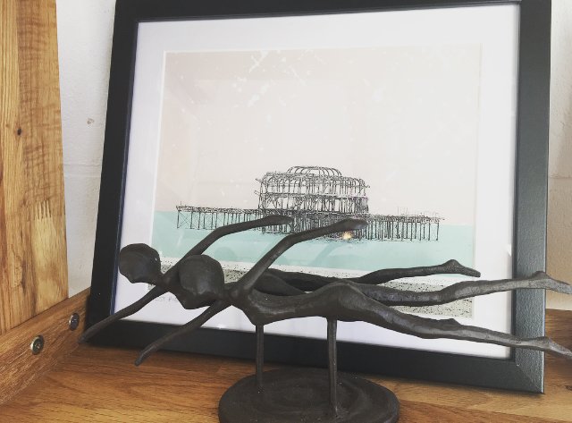 In many Eastern European countries, it is thought to bring good luck to swim in icy January waters. We'd rather observe the tradition in a warmer way with these cast iron swimmers and a 'West Pier' print by Kim Dobson.
#affordableart #westpier #brightonartist #brightonart #giclee