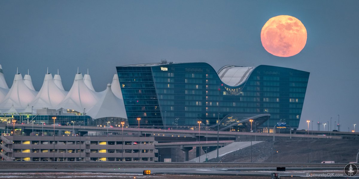 Great shot of the moon over DEN courtesy of David K.