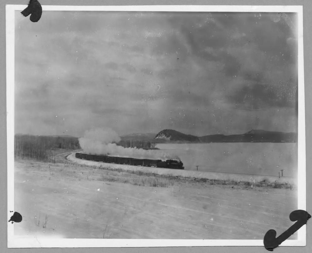 NCTR_UM's tweet photo. January 2, 1937 at 5:30pm - the four boy's frozen little bodies were discovered on the surface of Fraser Lake, only 3/4 of a mile from Nautley Reserve, their home. #ThefourboysofLejac #TruthB4
Photo: 10a-c000441-d0001-001, photo of Fraser Lake behind the train. https://t.co/ajISmhJiNd