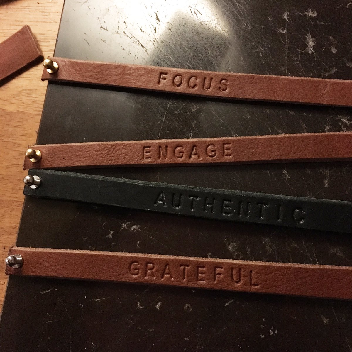 scottim's tweet photo. Putting the finishing touches on these great 2018 leather theme bracelets! If you have a a growth theme this year and want a great daily reminder of your theme, let me know! I would love to make a bracelet for you! Cost is only $10! #writeoneword #2018theme #reminder #keepgrowing https://t.co/XcpWnW2dtV