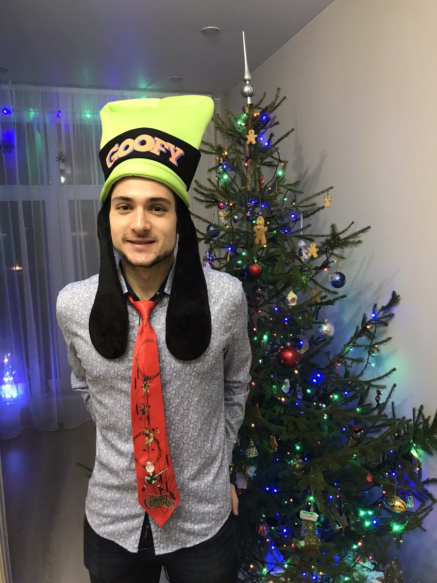 BoykoVictorV's tweet photo. Met the New 2018 Year dressed in Goofy hat from the Disneyworld, Orlando and a very special holiday tie with music and illumination built in! It is almost a tradition to dress up like this for the last several years! Happy New Year everyone! 🎄🎅🏻🎁 https://t.co/87zb9tijsS