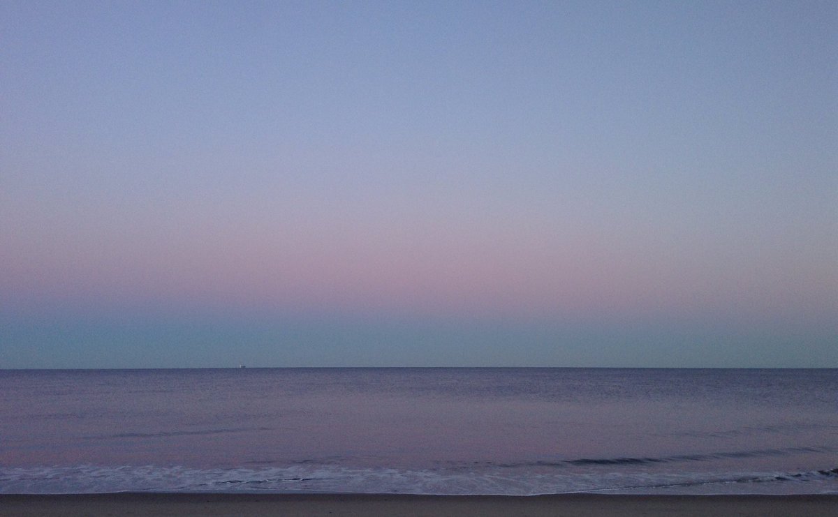 LoveReho's tweet photo. Calm and cold at the shore today. Rehoboth Beach, DE #delegram #nofilter #sunset #delaware https://t.co/KEY4lA6992