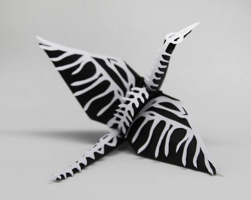 designboom's tweet photo. origami enthusiast cristian marianciuc makes mini paper cranes with character https://t.co/hHRFRGy9Hg https://t.co/NYa6J0dZ09