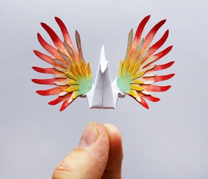designboom's tweet photo. origami enthusiast cristian marianciuc makes mini paper cranes with character https://t.co/hHRFRGy9Hg https://t.co/NYa6J0dZ09