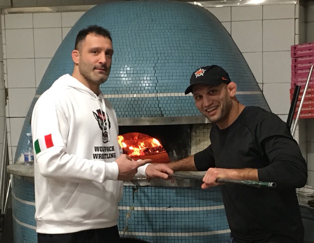 jmenwrestling's tweet photo. Pizza time @zachesposito with @CowboyWrestling and @pat_popolizio with @PackWrestle  in Napoli Italy https://t.co/gqLJDc8IfA
