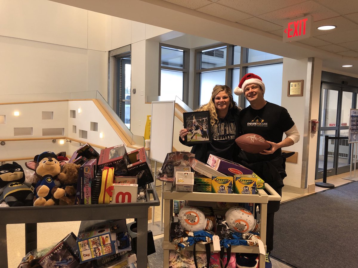 enduretocure's tweet photo. While we were postponed a day due to a Christmas morning snowstorm in Boston, we visited Floating Hospital for Children at Tufts Medical Center to hand out holiday gifts to kids in cancer treatment and their families. So many smiles. Thank you, donors &amp; #TeamE2C members! https://t.co/PWVV2B16AS