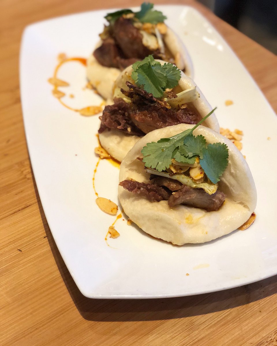 The #BonesBuns tonight are the perfect mix of crunchy, salty and sweet. Indian Spice-Glazed Duck Confit, Curried Cauliflower, Toasted Almonds and Cilantro.