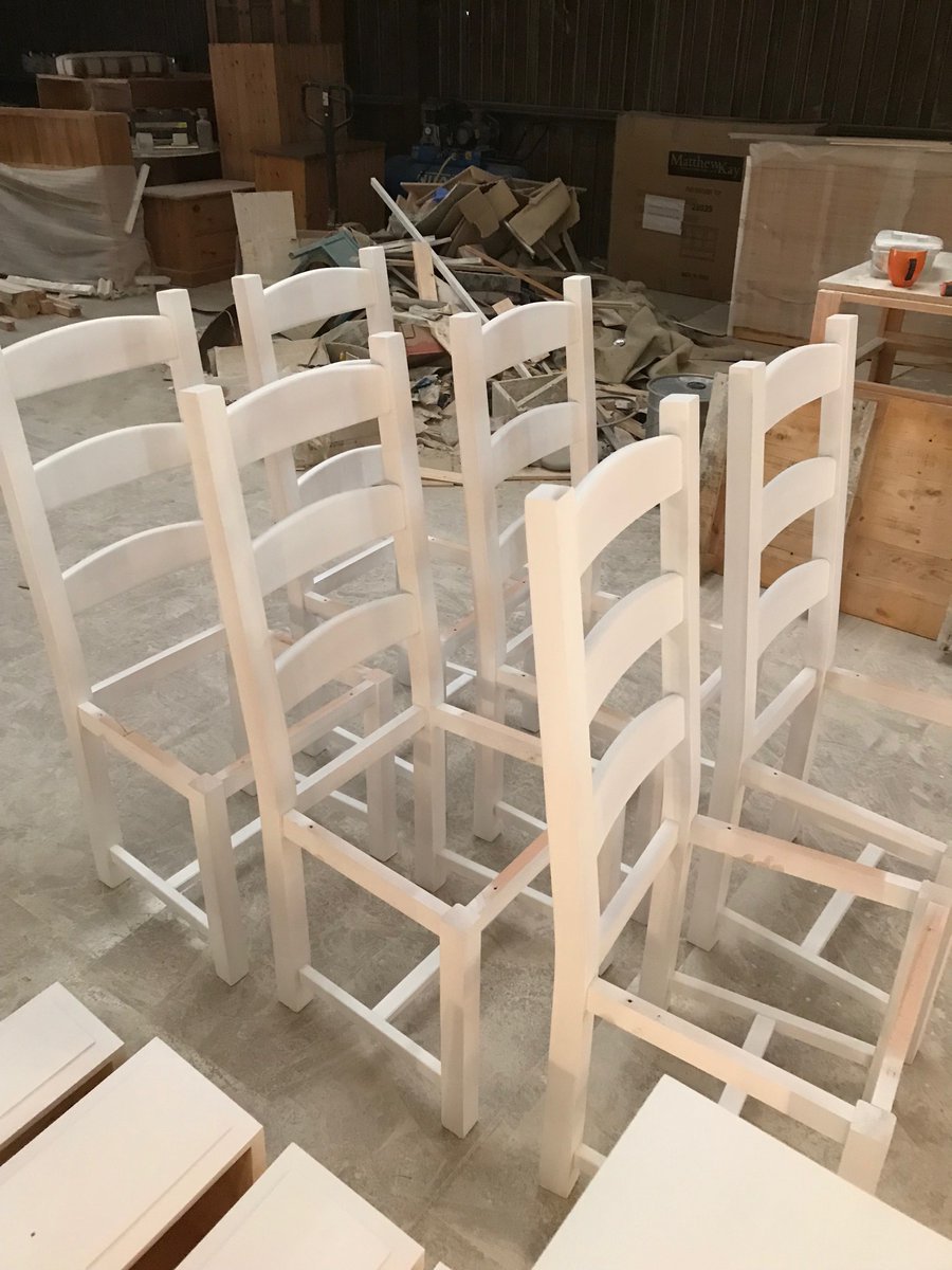 These chairs are literally queueing for their paint job and finishing touches #handmade #furniture #chairs #pine