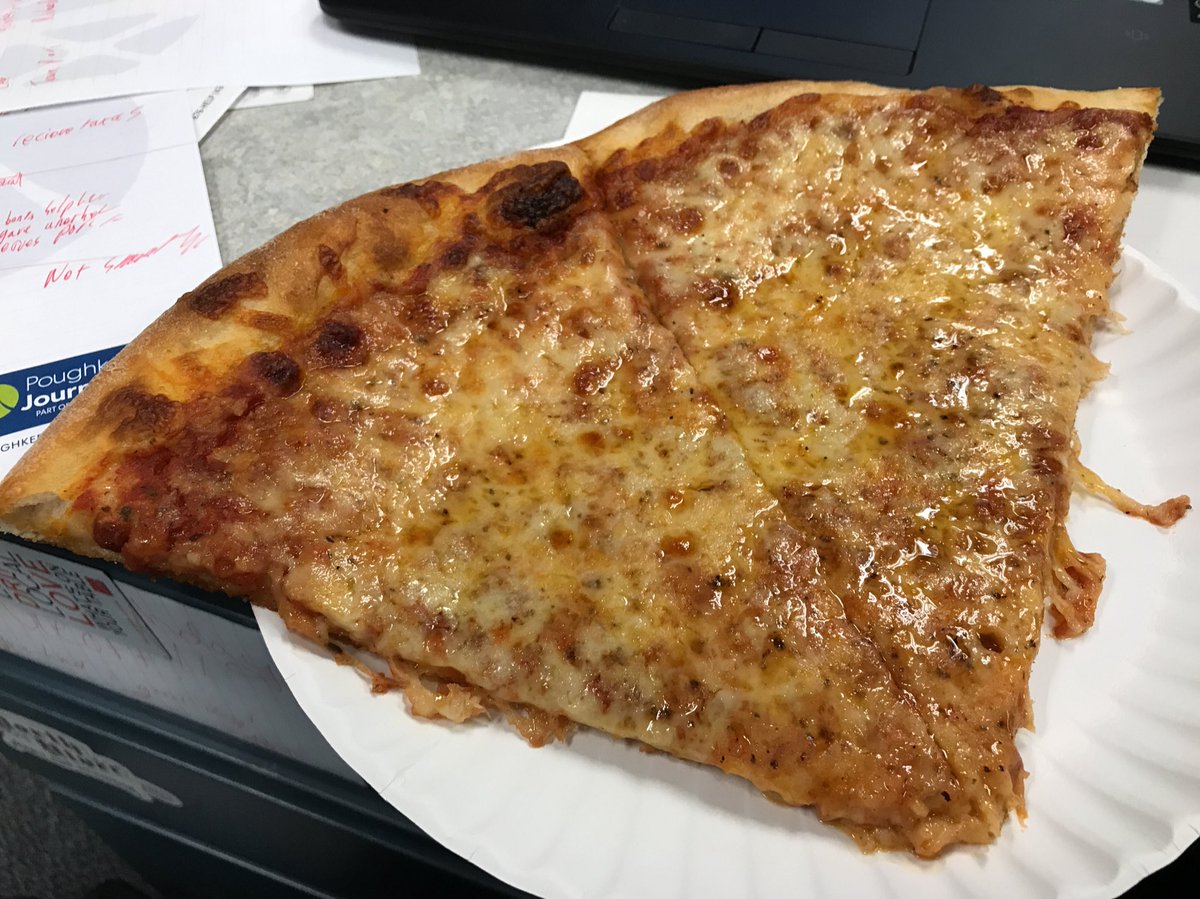 GeoffWilson_'s tweet photo. Newsroom pizza: the silver lining of any snowstorm. #blizzard2018 #snowday #PJSnow https://t.co/AVBhUuklDy