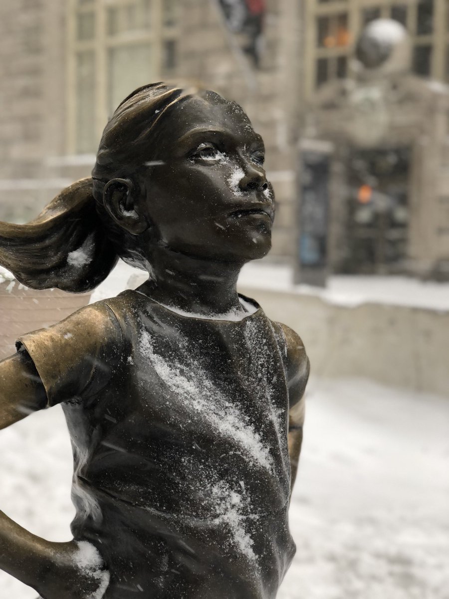 NYSE's tweet photo. #Fearlessgirl isn’t afraid of the #BombCyclone https://t.co/HCvvq7l2nY