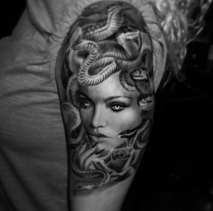 Black and grey realistic Medusa portrait tattoo by Sunny Lovan at Dark Age Tattoo...