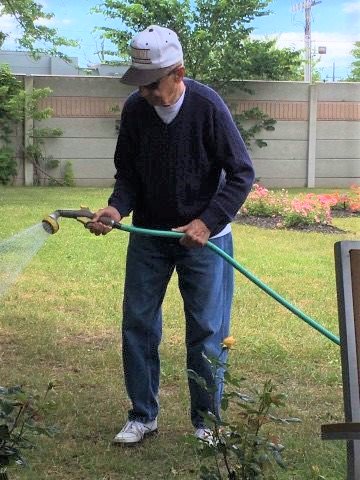 VillaDeRose's tweet photo. #TBT to warm, sunny days that we could spend outside! 
Pictured here is Resident Andy Gabel tending to our Memorial Rose Garden. #ThrowbackThursday #HurryUpSpring https://t.co/KAcPDMAPdR