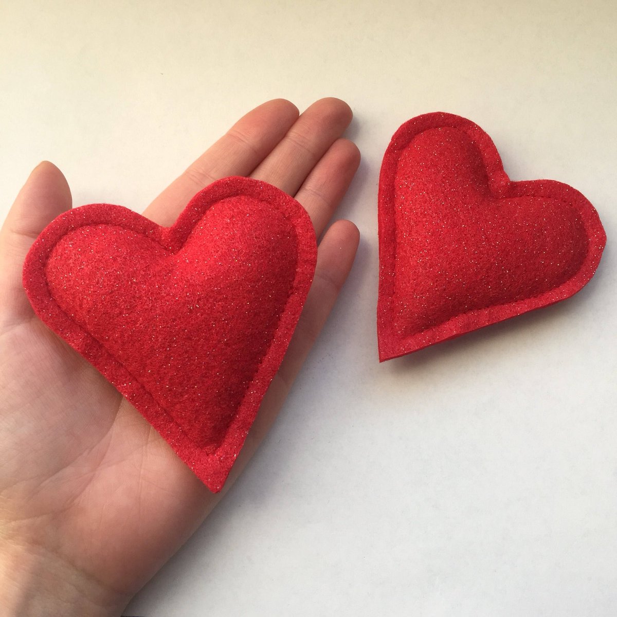 FurballFanatic's tweet photo. Excited to share the latest addition to my #etsy shop: 2 pack of Glitter Catnip Heart Toys.  https://t.co/JpRHVkugsc https://t.co/EQZTQtKgYR