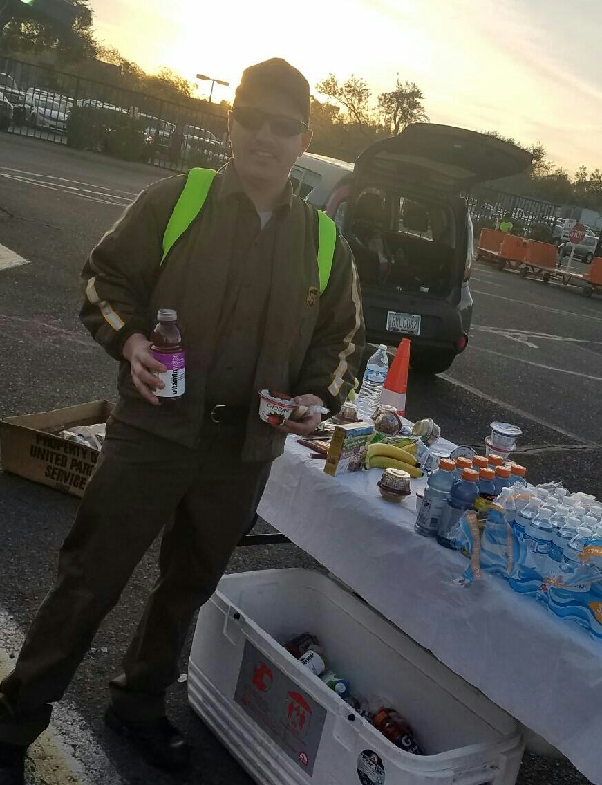 UPSphoenix's tweet photo. Communicate in traffic use? Healthy start yogurt, vitamin water and humus. Most important stop Scott Bollinger with his kids this morning receiving UPS trucks from Jeremy from Camelback Center. #UPSTEMPE @MPZakely @relmessan @DesertMTUPSers @TempeSafety @kennethcherry26 https://t.co/hTQTAHAFzS