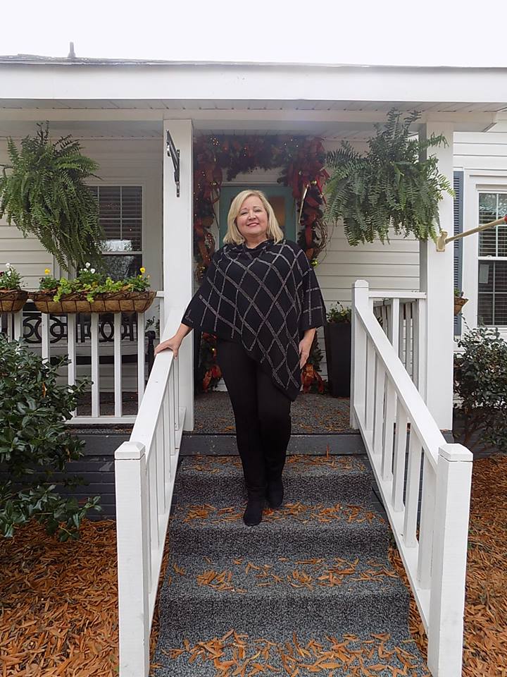 Mrs. Sandra Edwards looks fabulous in our studded diamond shape poncho &amp; our power stretch black pants. Both are incredibly comfortable, &amp; you can steal her look (for 50% off!) by shopping with us. We have only 2 ponchos left, so hurry in &amp; get yours before they're all gone!