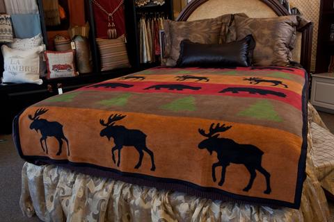 Rustic orange, wildlife silhouettes, and the comfiest fabric you’ll ever feel. Our Northern Comfort wrap is a must have this winter! 
Read More: ow.ly/r8CW30hvTH8
#WrapYourselfintheMoment #NorthernComfort #ChappyWrap