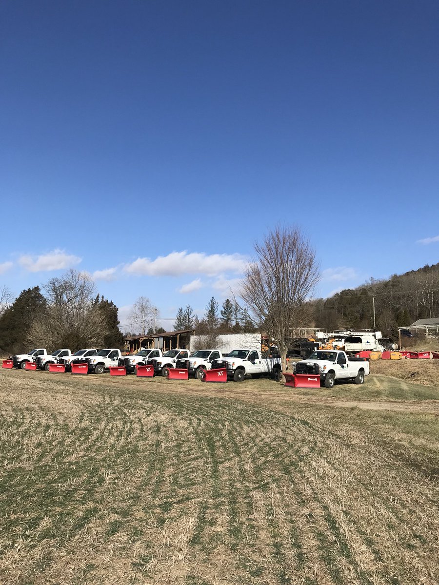 Our trucks are lined up and ready for some snow! Now the waiting game begins...
