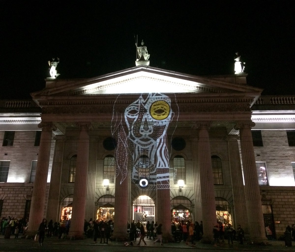 HerstoryIreland's tweet image. The Goddess Bríd aka Saint Brigid, Matron Saint of Ireland and first recorded abortionist lighting up the GPO in Dublin City. Art by Louise Rowland. Bazooka #IlluminateHerstory by GeoPop ##repealthe8th #freesafelegal #NollaignamBan