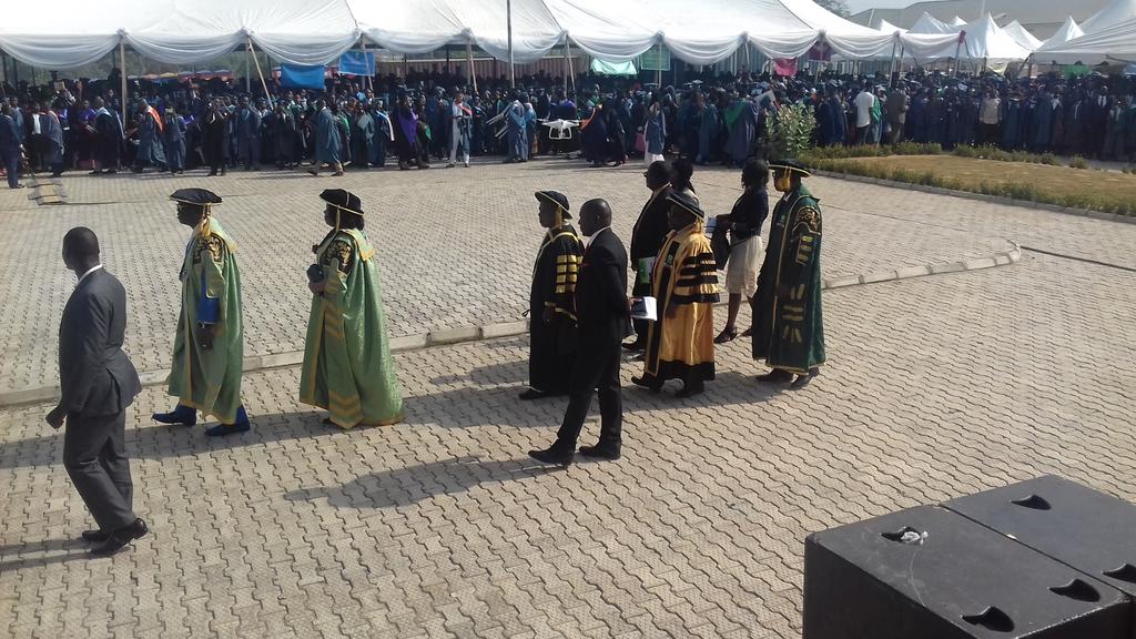 nounofficial_'s tweet photo. NOUN's first PhD graduate and Nigeria's former president, Chief Olusegun Obasanjo being led into the Convocation arena https://t.co/ZX6ilHORYu