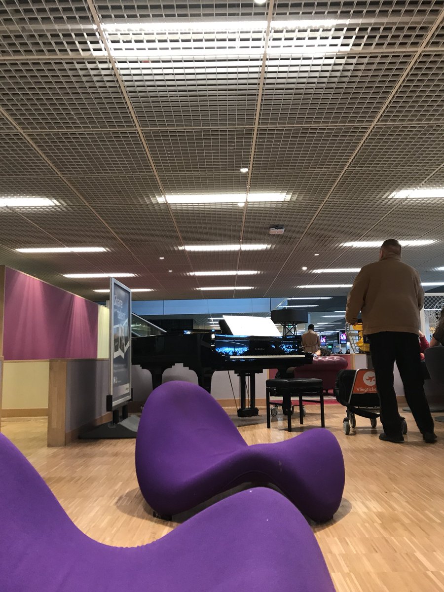 anneveinberg's tweet photo. The Netherlands are full of pianos in public places but I never have the nerve to play. Are there more professional pianists that feel intimidated by these casual pianos and amateurs that play them with such ease? #flightdelay #schiphol #musoproblems https://t.co/oWOpmbuWts