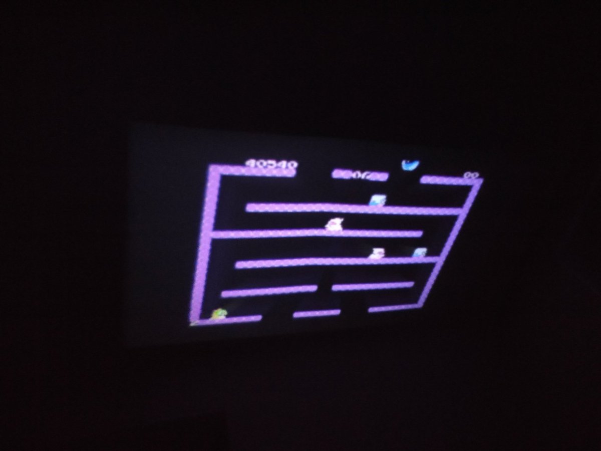 AlexDWood's tweet image. Made this Retropie-based game console with a Raspberry Pi Zero W and cheapo projector. The case is only cardboard but Nintendo just made that ok