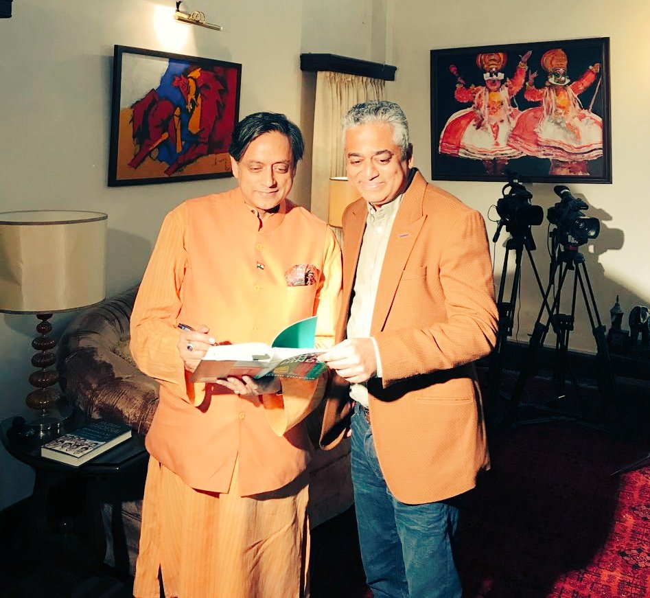 ShashiTharoor's tweet photo. Autographing a copy of #WhyIAmAHindu for @sardesairajdeep after his half-hour interview with me for @IndiaToday TV which will be broadcast this weekend https://t.co/fUnXR9n9Mv