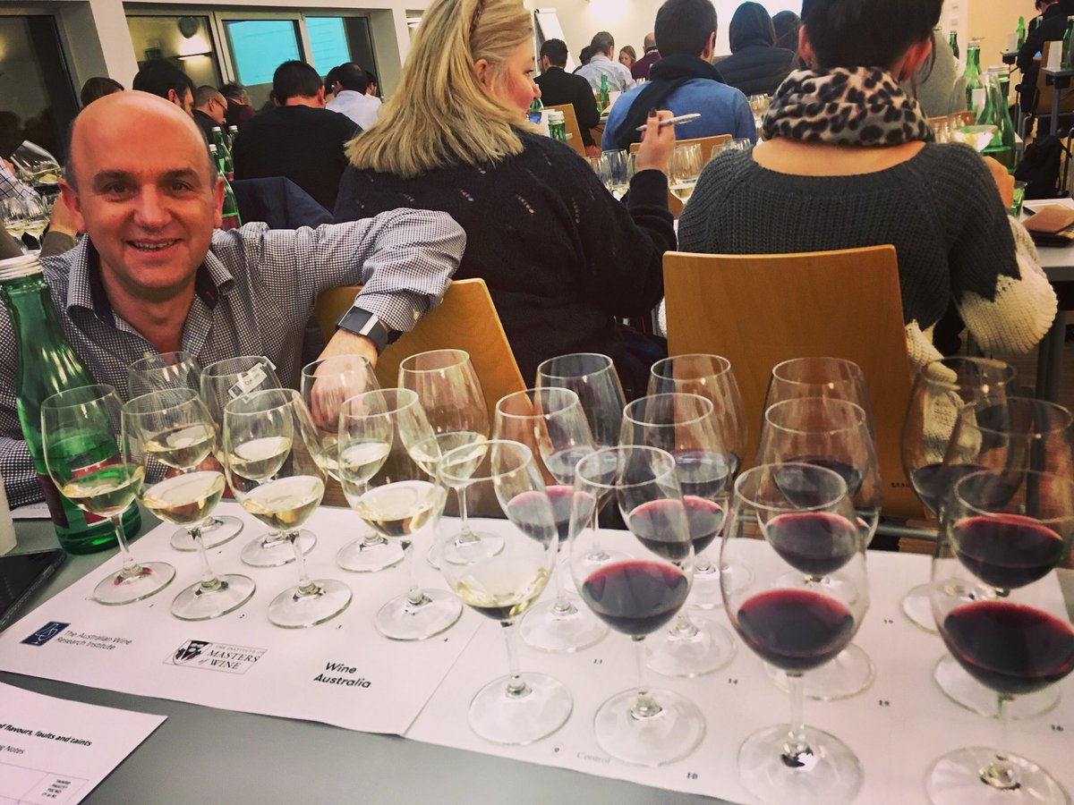 SarahKnowles's tweet image. The smile of a man that’s given a room of MW students 20 deliberately faulty wines... @mastersofwine @winesaustralia #wine #winefaults #ConSimos