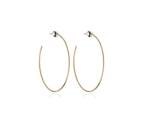 Top off your winter whites with the #VitaFede Sfera Hoop Earrings ❄️ featured on <a href="/wmag/">W Magazine</a> bit.ly/2DyQflF #Shop the #style: bit.ly/2DknpZs  #wmagazine #Editorial