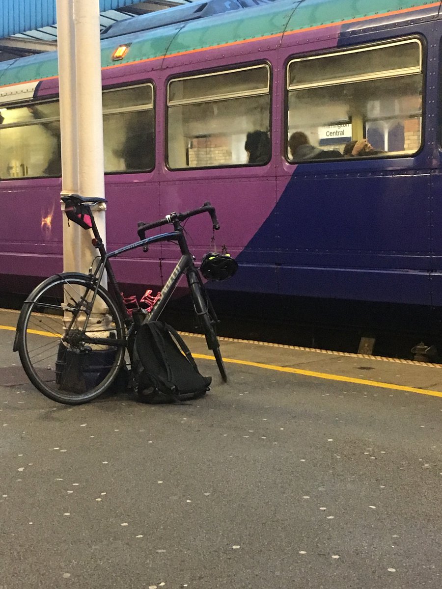 murftv's tweet photo. My bike was stolen from on board 1752 @EMTrains from Liverpool Lime Street. By the time I got to Warrington Central it was gone. All black road bike with bright pink bottle cages. Please share. https://t.co/TBdTQ4mBwv