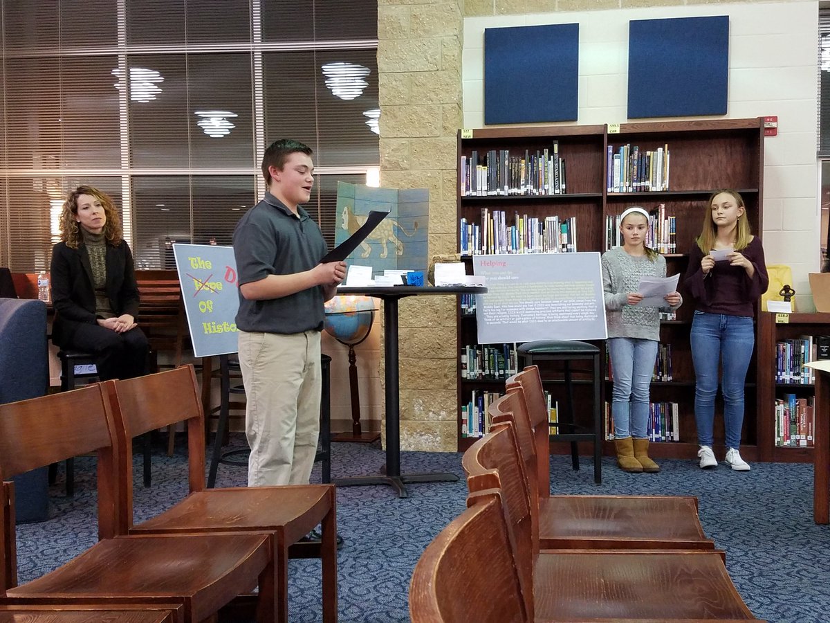 SEMS students present "The Death of History" at the Committee of the Whole Meeting.