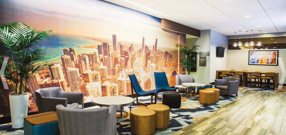 shnesy's tweet photo. I love seeing the creative approach to each of the newly renovated La Quinta hotels. This one in #Chicago brings in colors that represent the city -- blue for #LakeMichigan and gold for the city lights. #LQLocal https://t.co/2vUByLERNl https://t.co/mW9Mj77pbX