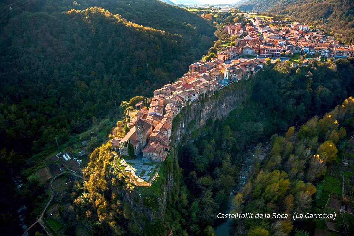 Aerial View Of Castellfollit De La Roca Cliff Village In Catalonia